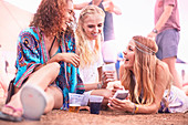 Friends hanging out at music festival