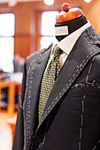 Tailored suit on dressmakers model
