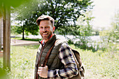 Smiling hiker with backpack