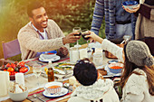 Couple toasting wine glasses