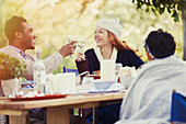 Couple toasting wine glasses