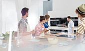 Students taking notes in cooking class