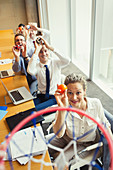 Business people playing in conference room