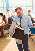 Stressed businessman struggling to multitask