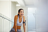 Woman listening to music post workout