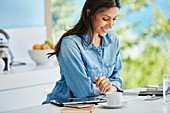 Woman working reviewing paperwork