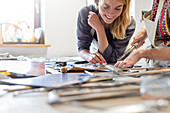 Stained glass artists working in studio