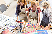 Stained glass artists working in studio