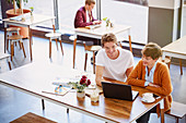 Business people drinking coffee meeting in cafe