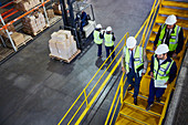 Forklift, managers and workers