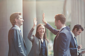 Business people high-fiving