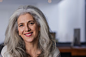 Portrait smiling mature woman with long, grey hair