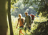 Couple with backpacks hiking