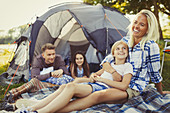 Smiling family relaxing