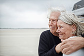 Affectionate senior couple hugging