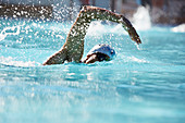 Male swimmer athlete swimming