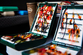 Fly fishing hook reels in tackle boxes