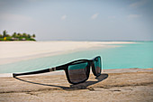 Close up sunglasses on beach