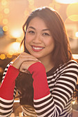 Portrait Chinese woman wearing striped sweater