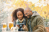 Young couple drinking beer