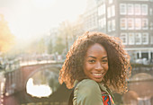 Young woman along canal