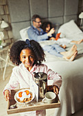 Portrait girl serving Father's Day breakfast