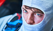 Close up race car driver wearing protective mask