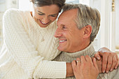 Close up mature couple hugging and