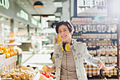Portrait smiling, confident woman in market