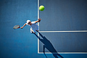Overhead view of tennis player playing tennis