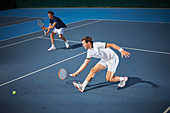 Young tennis doubles players playing tennis