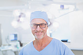 Portrait confident mature male surgeon