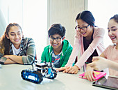 Students programming and testing robotics
