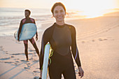 Portrait woman in wet suit with family