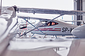 Small airplane in hangar