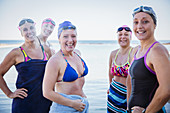 Portrait swimmers drying off with towels