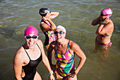 Overhead portrait female swimmers wading
