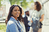 Portrait smiling, confident woman in sunny park