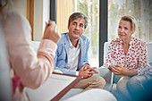 Couple listening to therapist