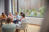 Women talking in group therapy session