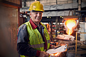 Portrait confident steelworker supervisor
