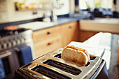 Toast in toaster in kitchen