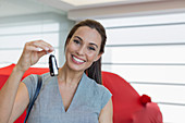 Portrait smiling customer holding car keys