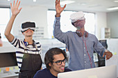 Computer programmers testing VR simulators