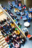 Defocused overhead view of conference audience