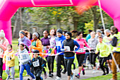 Runners crossing finish line