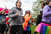 Runners running at charity run in park