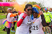 Portrait confident, runners cheering