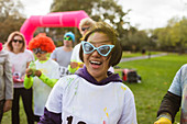 Portrait female runner in silly sunglasses