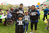 Portrait family runners showing marathon bibs